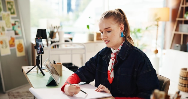 Open notebook and pen on a wooden desk